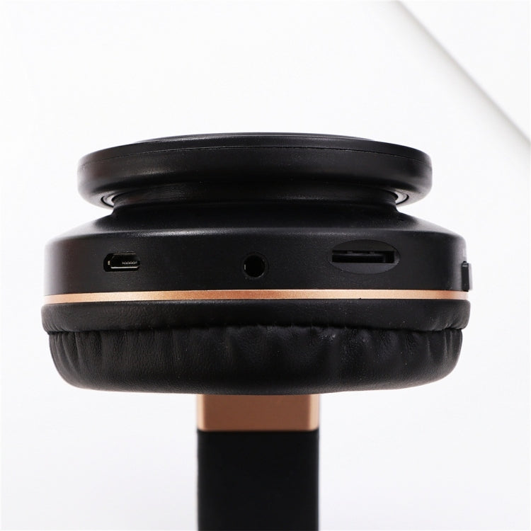 A1 Bluetooth 4.2 Candy Color Super Dock Bluetooth Headphones Support Music Playing and Switching Volume and Answer Control (Gold)